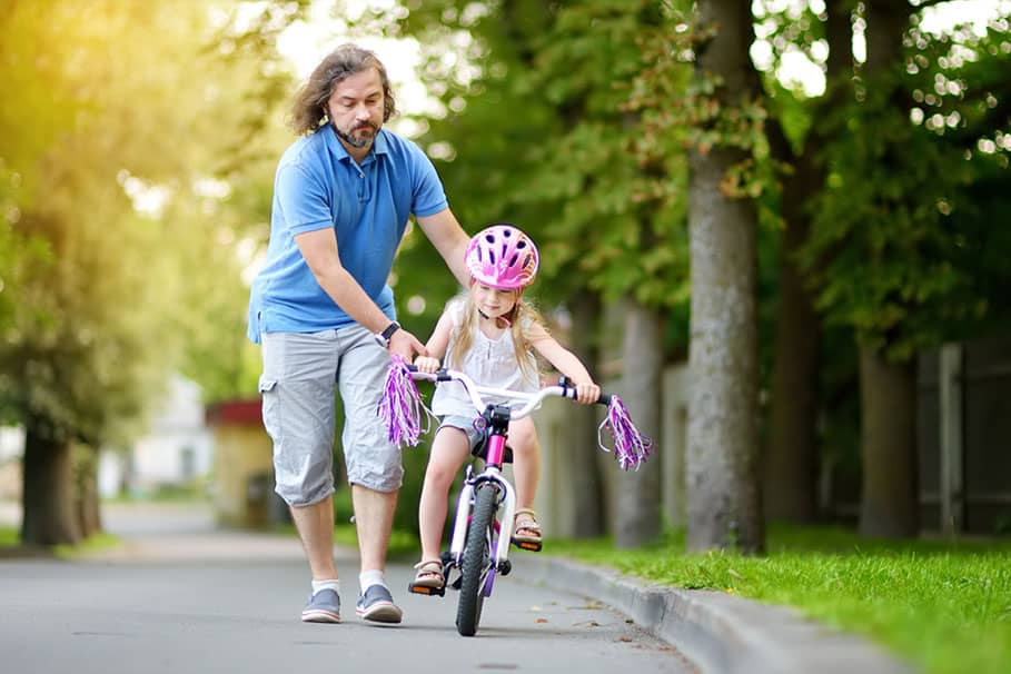 how to teach kid how to ride bike